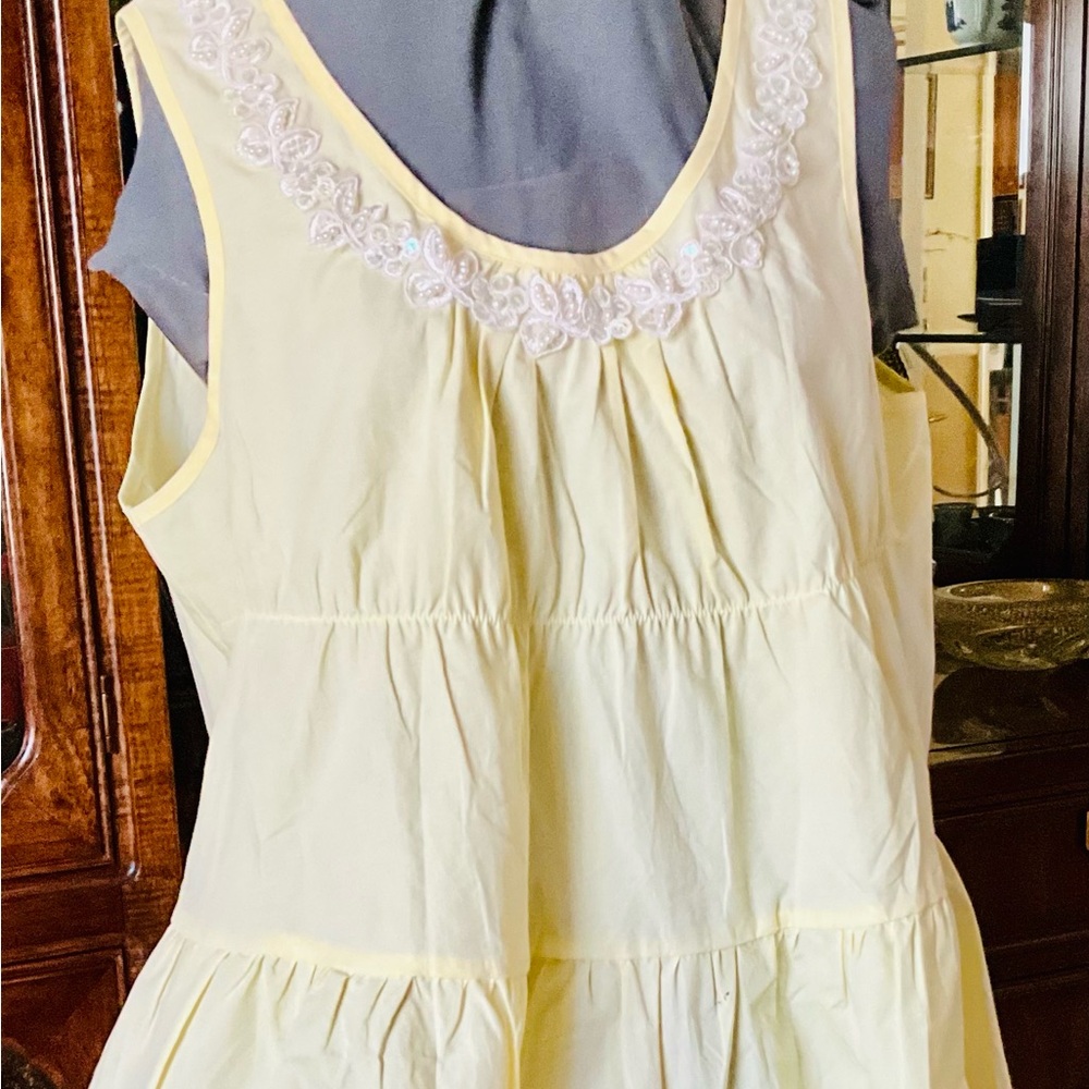 Light Yellow Sleeveless Tiered Top with Lace Trim